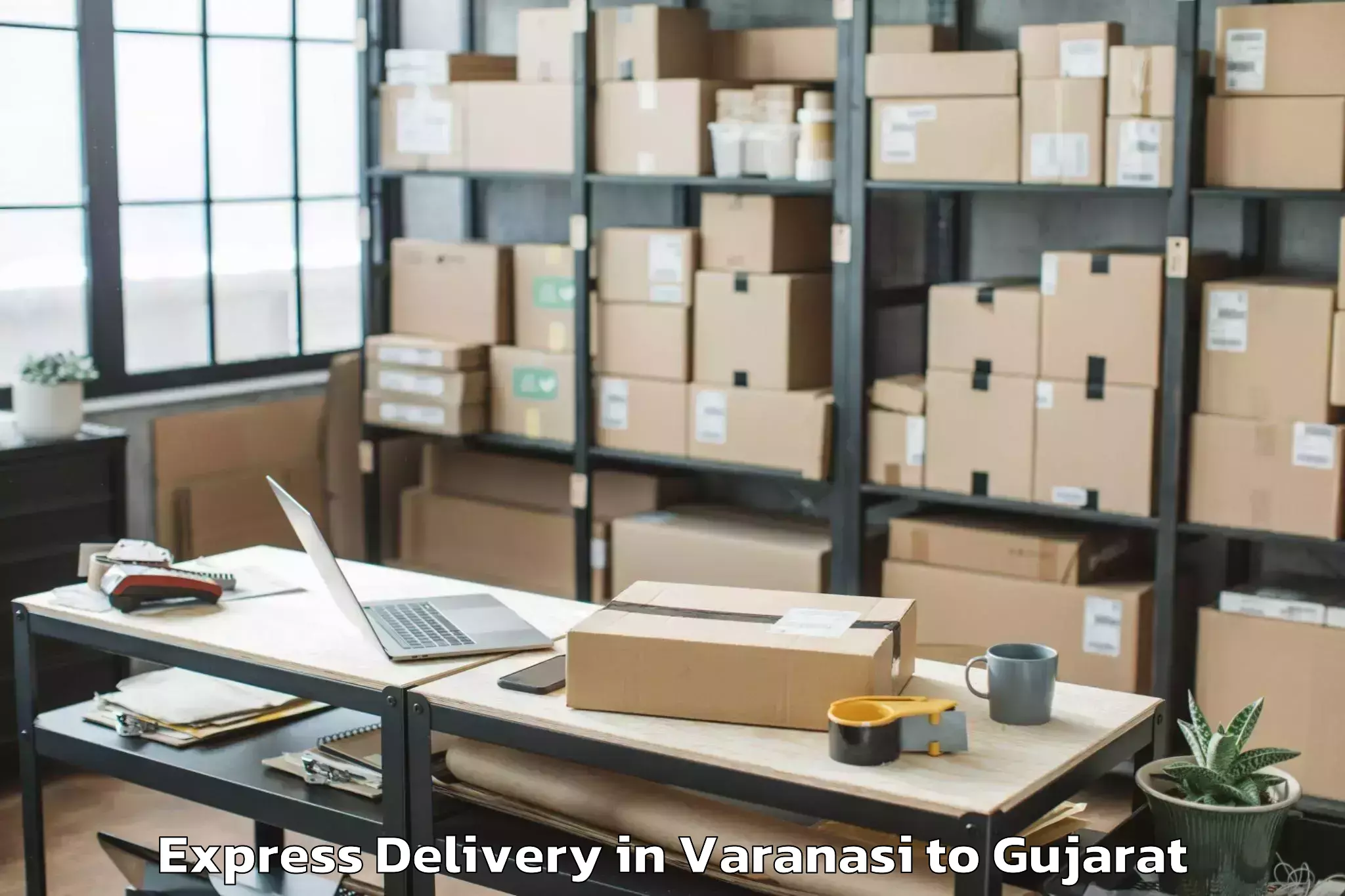 Reliable Varanasi to Crystal Mall Rajkot Express Delivery